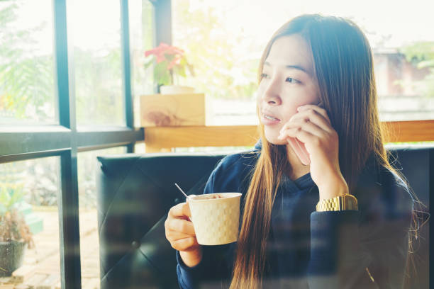 istock woman using on mobile phone during rest in coffee shop 684900408