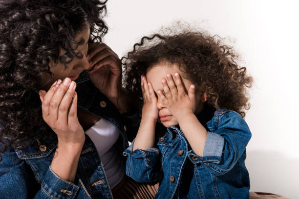 istock mother playing hide-and-seek with daughter 684921478