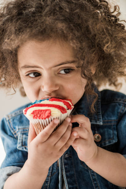 istock girl with american flag muffin 684927260
