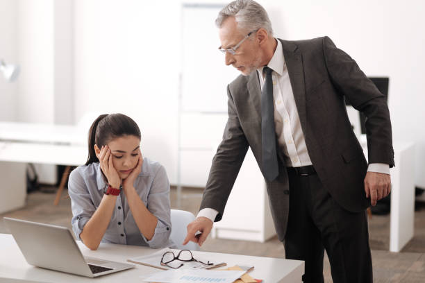 istock Attentive office worker listening to her boss 684928502