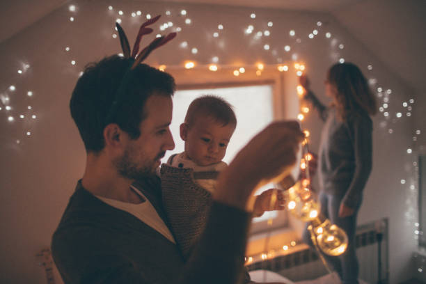 istock Family decorating for Christmas 684931506