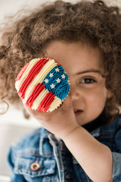 istock girl with american flag muffin 684931672