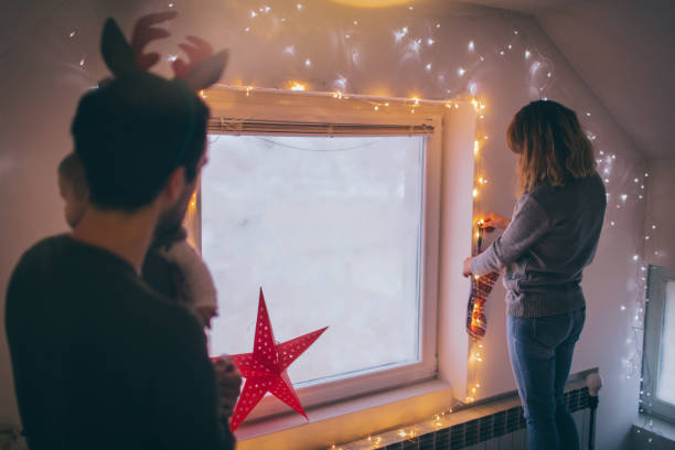 istock Family decorating for Christmas 684931826