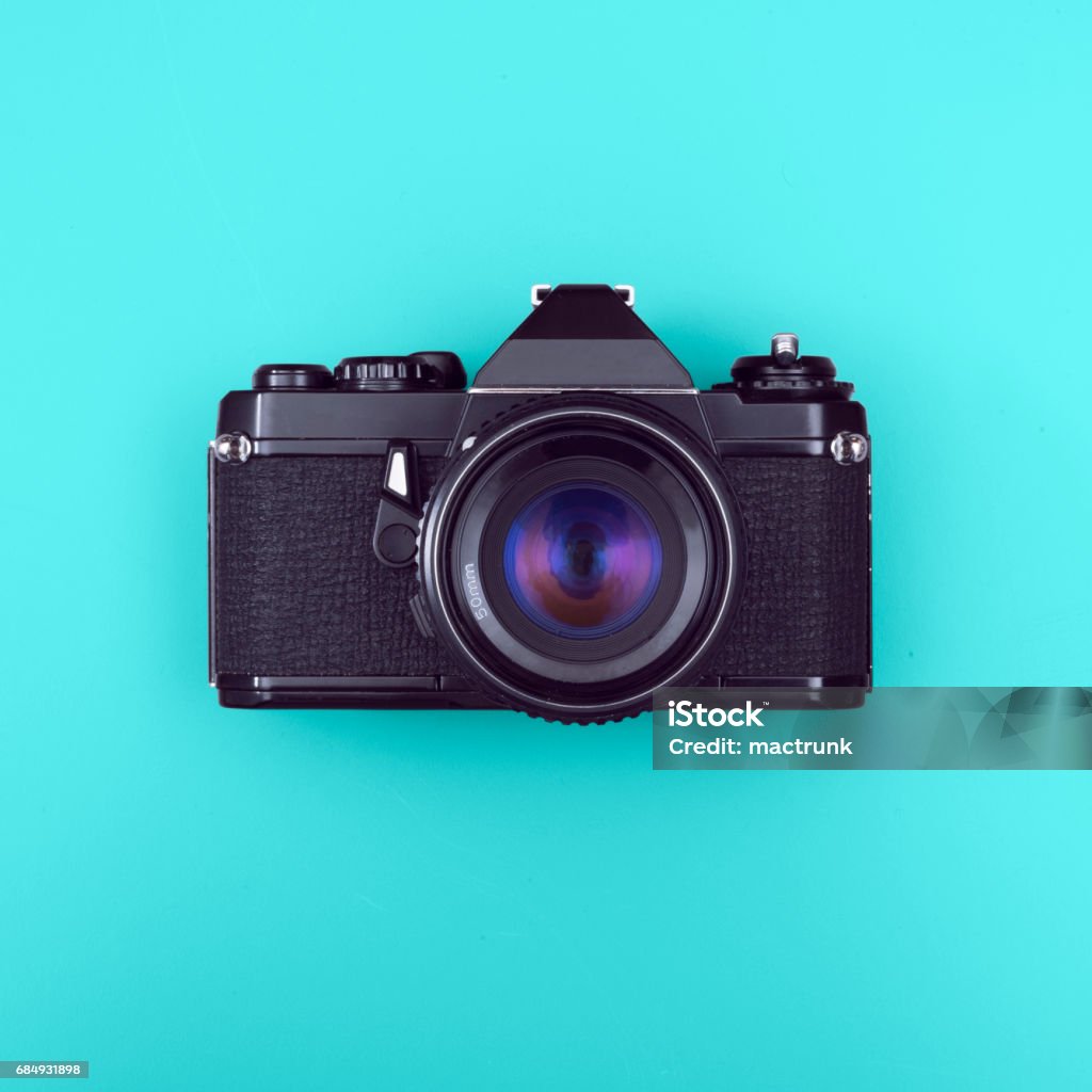 Retro-Kamera - Lizenzfrei Farbiger Hintergrund Stock-Foto