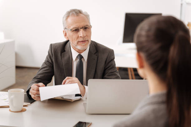 istock Kind male person looking at his secretary 684935204