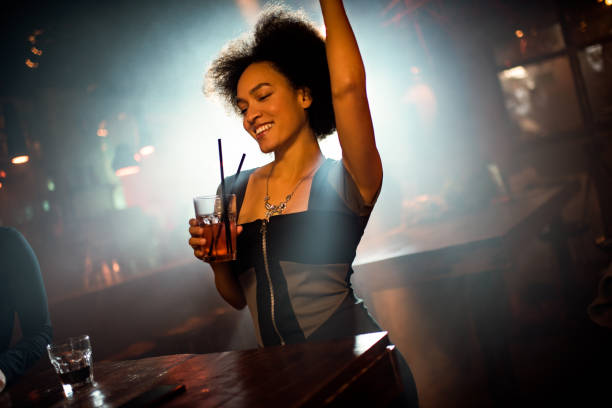 istock Woman dancing in the club 684936430