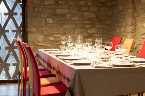 istock table setting in a living room with stone walls. 684939798