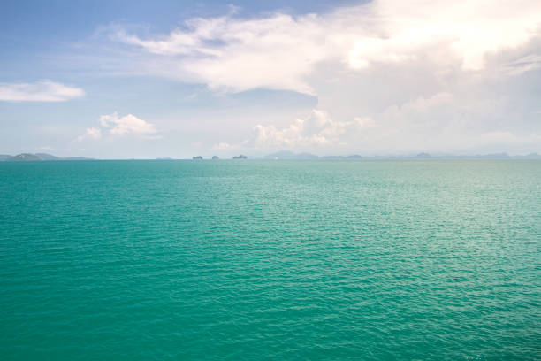 istock Blue sea waves surface soft and clear sky abstract background 684940678