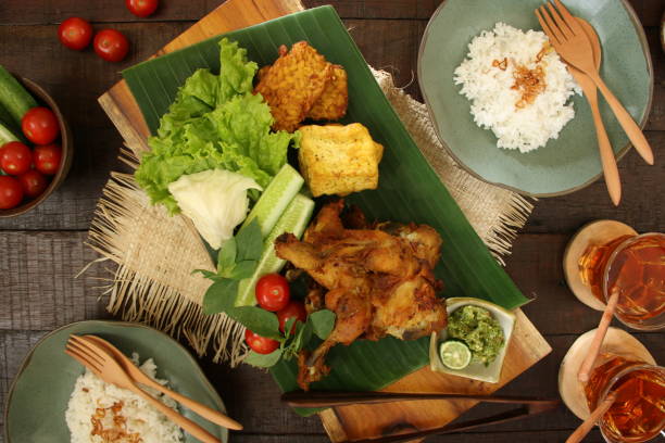 istock Green Sambal Chicken, Javanese Smashed Fried Chicken with Green Chili Paste 684944184