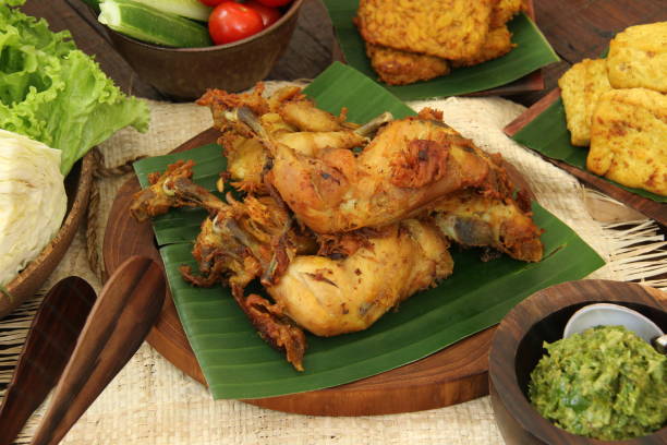 istock Green Sambal Chicken, Javanese Smashed Fried Chicken with Green Chili Paste 684944216
