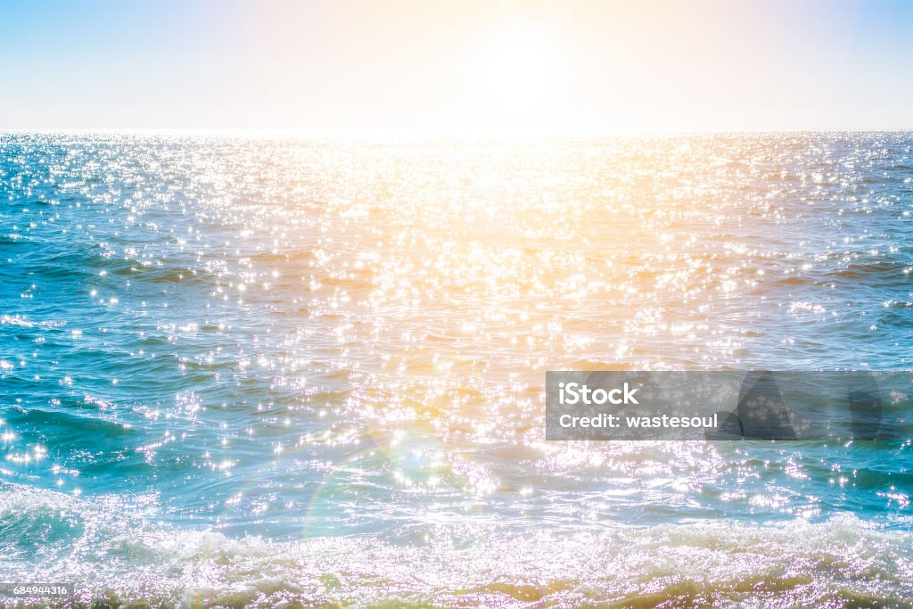 Sparkling rippled water surface Sparkling rippled water surface in bright blue colors Blue Stock Photo