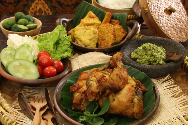 istock Green Sambal Chicken, Javanese Smashed Fried Chicken with Green Chili Paste 684944354