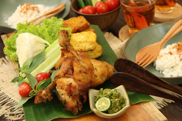 istock Green Sambal Chicken, Javanese Smashed Fried Chicken with Green Chili Paste 684944366