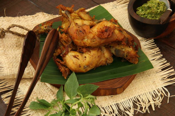 istock Green Sambal Chicken, Javanese Smashed Fried Chicken with Green Chili Paste 684944432