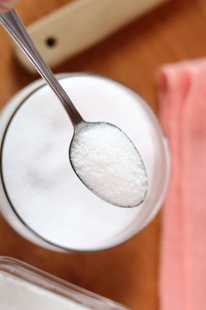 istock Teaspoon of sugar. Making mayonnaise with a wooden spoon. 684947216