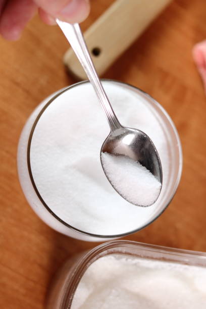 istock Teaspoon of salt. Making mayonnaise with a wooden spoon. 684955248