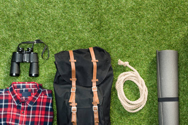 istock Traveler set on grassy background, flat lay 684970186