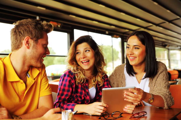 istock Group of people resting in the cafe 684977764
