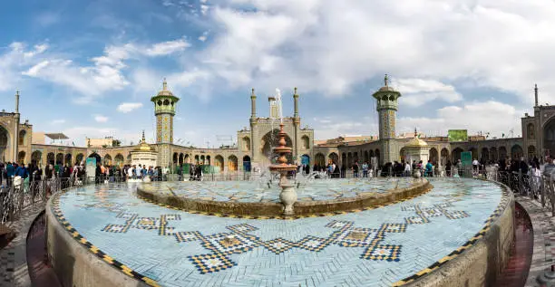 The shrine of Fatima Almasomh. It is the shrine to the Shiite sect and is located in the city of Qom. And contains a huge golden dome and a number of minarets aureus and the huge doors.