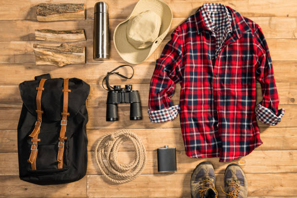 istock Traveler set on wooden background, flat lay 684988076