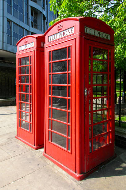 istock Two red phone booths in London 685043392