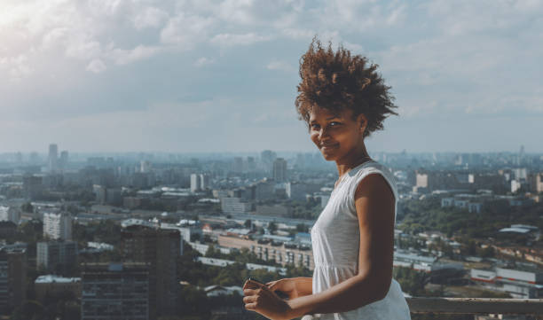 istock Black girl on high balckony 685047146