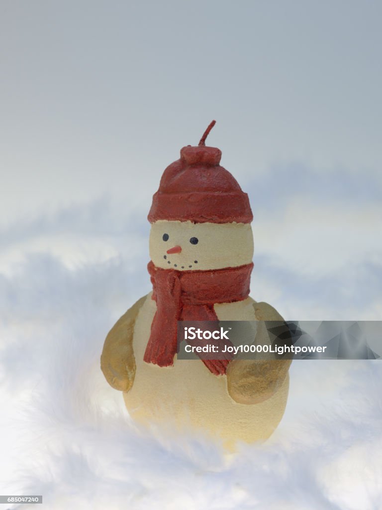 Candle of Snowman Candle of Snowman for Christmas Blue Stock Photo