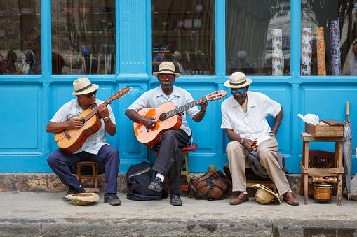 Havana, Cuba - March 24, 2017: Elderly street musicians playing traditional cuban music on the street in old Havana.
