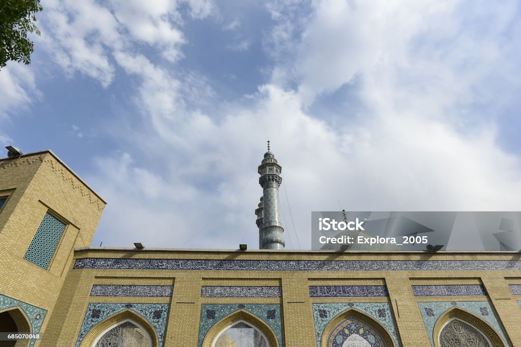 The shrine of Fatima Almasomh The shrine of Fatima Almasomh. It is the shrine to the Shiite sect and is located in the city of Qom. And contains a huge golden dome and a number of minarets aureus and the huge doors. Architectural Dome Stock Photo