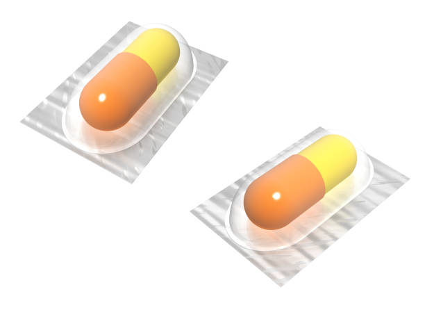 istock Yellow and orange pills or capsules 685091774