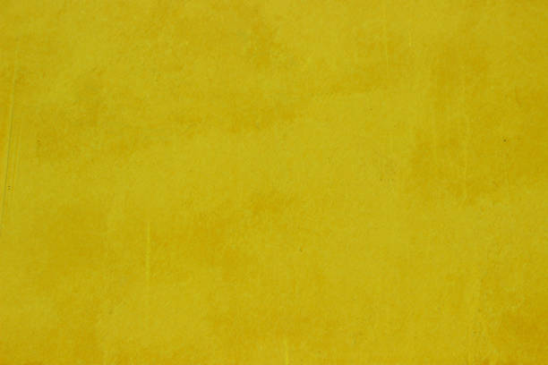 istock yellow background texture of concrete. stone wall 685118268