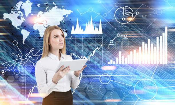 istock Woman with tablet and graphs in the air 685118376