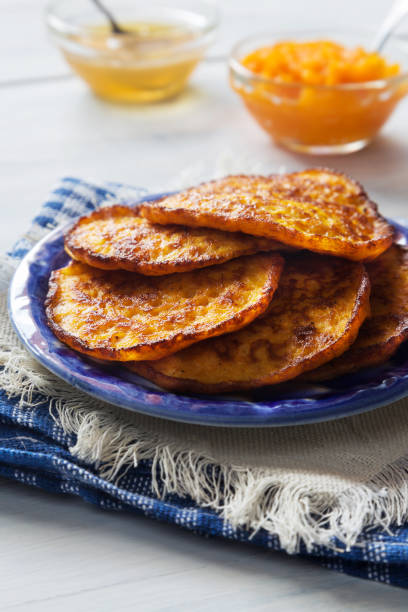 istock Pumpkin pancakes with honey and tea 685118830