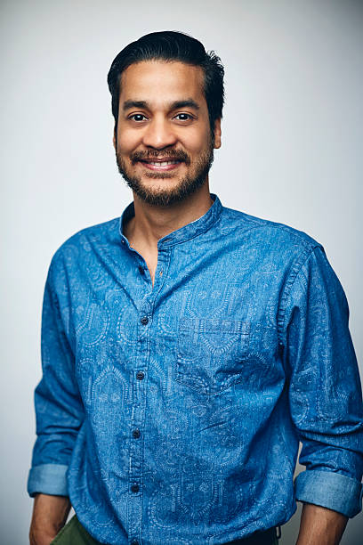 confident businessman in shirt smiling over white - brown eyes fotografías e imágenes de stock