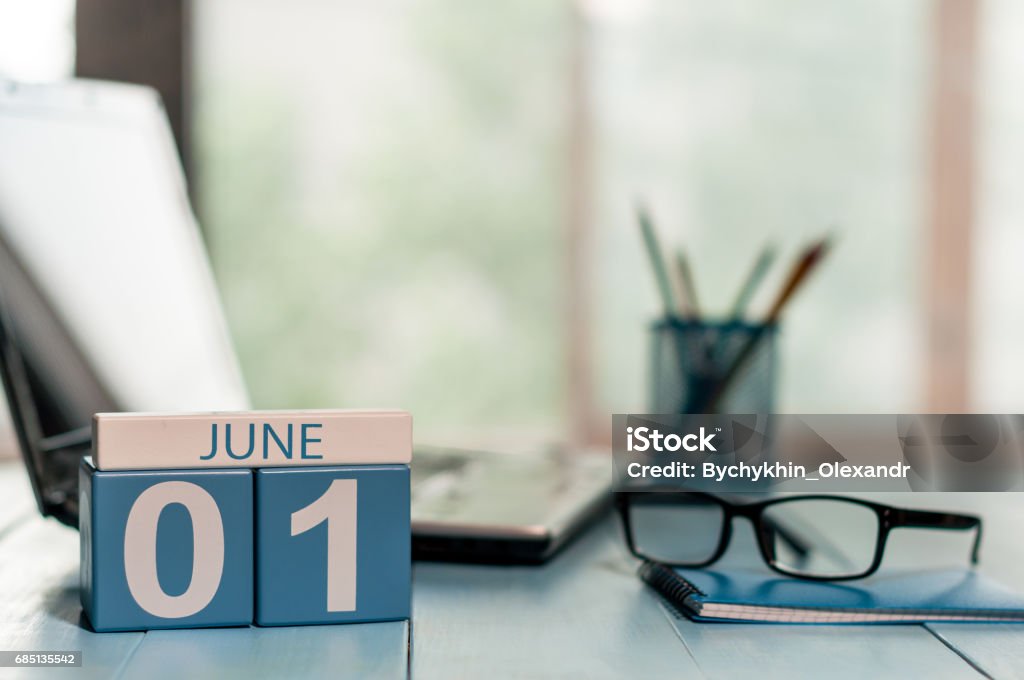 June 1st. Day of the month 1 , wooden color calendar on business workplace background. Summer concept. Empty space for text June 1st. Day of the month 1 , wooden color calendar on business workplace background. Summer concept. Empty space for text. June Stock Photo