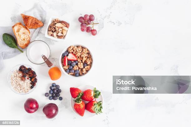 Healthy Breakfast With Muesli Yogurt Fruits Berries Nuts Stock Photo - Download Image Now