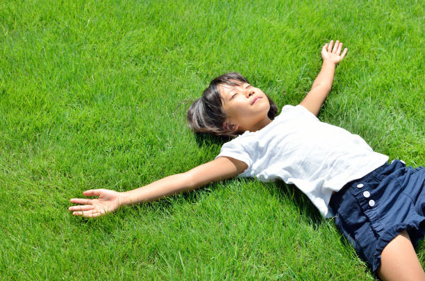 istock Girl taking a break in the lawn square 685165556