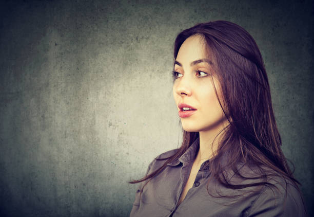 istock side profile of beautiful woman 685165670