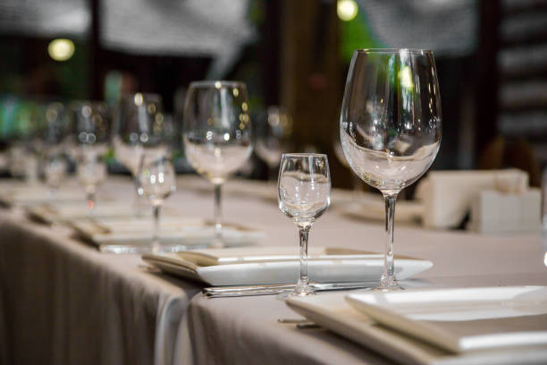 istock catering table set service with silverware, napkin and glass at restaurant before party 685168102
