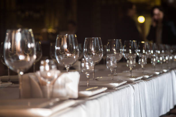 istock catering table set service with silverware, napkin and glass at restaurant before party 685168328
