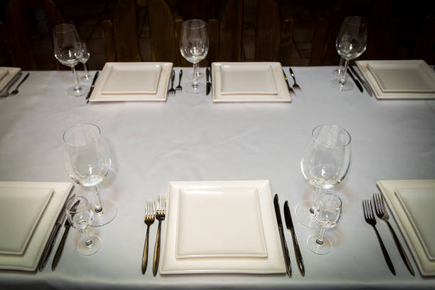 istock catering table set service with silverware, napkin and glass at restaurant before party 685168572