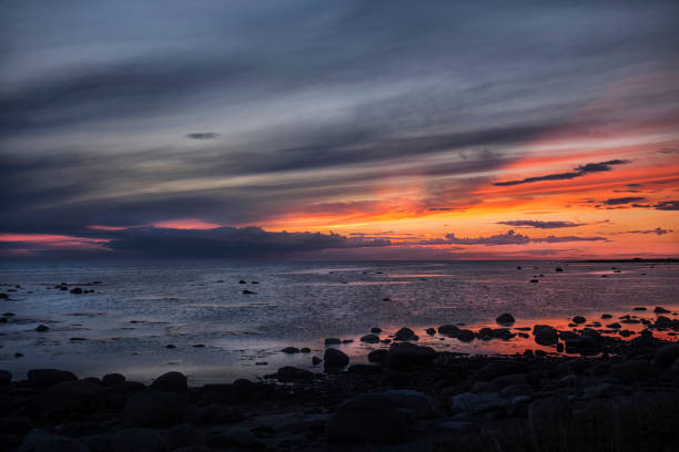 istock Sunset diverges sun over the sea 685173078