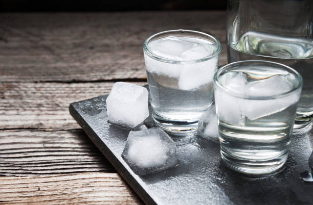 istock Vodka with ice in shot glasses 685192280