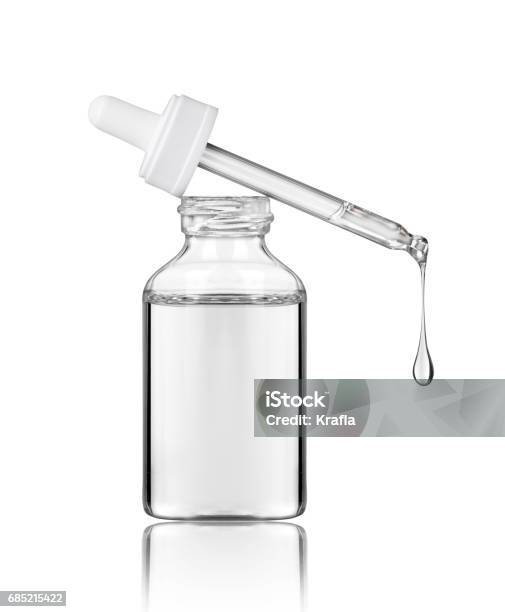 Cosmetic Bottle With Pipette On White Background Stock Photo - Download Image Now - Pipette, Bottle, Transparent