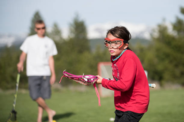 istock Girl learning to play Lacrosse 685220918