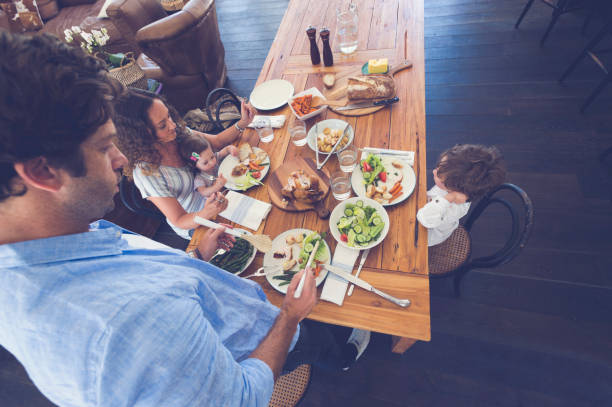 istock Family eating a meal at the table. 685238976