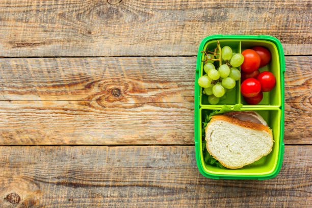 istock school lunch set with sandwich and vegetables in lunchbox background top view mock up 685255800