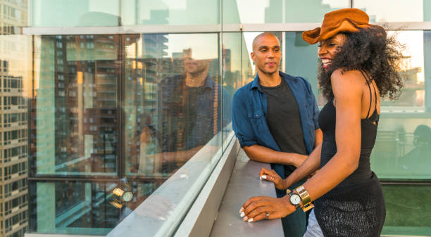 istock Young Latino couple have dinner and dating on rooftop 685276738