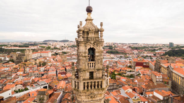 Porto cityscape with famous bell tower of Clerigos Church, Portugal aerial view Porto cityscape with famous bell tower of Clerigos Church, Portugal clergy stock pictures, royalty-free photos & images