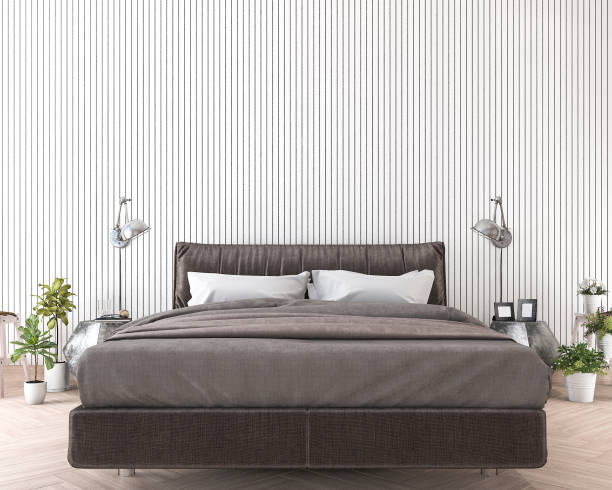 istock 3d rendering soft and comfortable bed near white wood wall 685373908